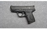 Smith & Wesson~M&P 9c Stainless~9mm Luger - 2 of 2