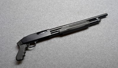 Mossberg~500~12 GA.