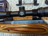 Sauer 100 300 Win Mag in Boyd Laminated Stock Bushnell 3-9X40 Scope - 2 of 2