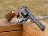 Colt Trooper MK V 357 with a 6 inch vent rib barrel.
- 18 of 19