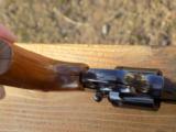 Colt Trooper MK V 357 with a 6 inch vent rib barrel.
- 12 of 19