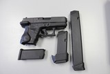 Glock Model 26 with Crimson Trace Laser, night sights and 3 mags. Cased. - 1 of 7