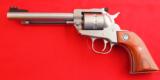 RUGER STAINLESS SINGLE TEN 10 SHOT REVOLVER IN 22CAL - 1 of 2