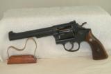 S&W K38, 5 Screw with original Gold box. Made in 1953.
- 2 of 6