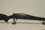 Weatherby Vanguard 7 M/M Rem Mag, synthetic stock, 22" barrel with factory muzzele brake - 2 of 11