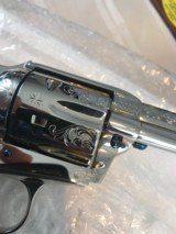 COLT SAA FACTORY MASTER ENGRAVED .45 BIRDSHEAD NICKEL FINISH
"B" ENGRAVED BY GEORGE SPRING - 10 of 14