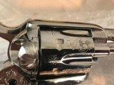 COLT SAA FACTORY MASTER ENGRAVED .45 BIRDSHEAD NICKEL FINISH
"B" ENGRAVED BY GEORGE SPRING - 12 of 14