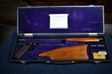 INCREDIBLE FIALA GUN AND EQUIPMENT COMPANYMODEL 1920 .22 SINGLE SHOT PISTOL / RIFLE 3 BARREL SET WITH FACTORY SUPPLIED CASE AND ACCESSORIES - Image 1 of 18