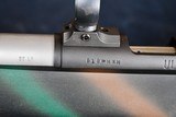 ULA (ULTRA LIGHT ARMS) MODEL 20 RF .22 -- MELVIN FORBES BUILT -- STAINLESS BARREL -- REPEATER -- WOODLAND CAMO -- EXCELLENT - 8 of 10