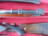 PETER MARHOLT OVER/UNDER 30-06 / 12 GA.
MATCHING SET ,CASED AND CLAW MOUNTED SCOPE. - 11 of 15