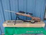 SAVAGE MODEL 12 BVSS 22-250 CAL.( FIRED ONLY 1 TIME SINCE NEW ) VARMIT/FLUTTED RIFLE,SCOPED &BOXED 99% - 1 of 13