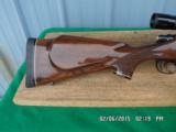REMINGTON LEFTHAND MODEL 700 BDL DELUXE 300 RUM ,NIKON MONARCH 5.5X16.5X50AO.99 % ORIGINAL. - 6 of 12