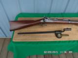 U.S.SPRINGFIELD MODEL 1884 (LOOKS UNISSUED)
45-70 TRAPDOOR RIFLE W/BAYONET SCABBARD AND FROG. ALL 95% PLUS ORIGINAL CONDITION. - 7 of 15