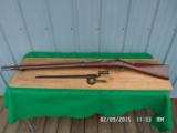 U.S.SPRINGFIELD MODEL 1884 (LOOKS UNISSUED)
45-70 TRAPDOOR RIFLE W/BAYONET SCABBARD AND FROG. ALL 95% PLUS ORIGINAL CONDITION. - 1 of 15