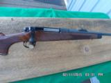 REMINGTONMODEL 700 BDL DELUXE IN (RARE) 8MM REM.MAG ,BEAUTIFUL FIGURED WALNUT,AS NEW,UNFIRED CONDITION! - 2 of 10