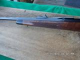 REMINGTONMODEL 700 BDL DELUXE IN (RARE) 8MM REM.MAG ,BEAUTIFUL FIGURED WALNUT,AS NEW,UNFIRED CONDITION! - 4 of 10