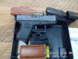 GLOCK
MODEL 27 SUB COMPACT 40 S&W PISTOL W / 2 LEATHER HOLSTERS ALL 99% COND. - 2 of 4