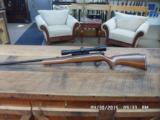 HARRINGTON & RICHARDSON "RARE" MODEL 700 SEMI-AUTO 22 WIN.MAGNUM RIFLE IN 99% PLUS ORIGINAL CONDITION AND SCOPED. - 1 of 10
