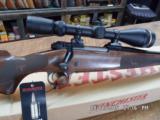 WINCHESTER 1995 MODEL 70 FEATHERWEIGHT DELUXE 223 WSSM CALIBER,LEUPOLD 4.5X14X40MM VXIII ALL NEW IN BOX. - 8 of 11