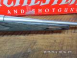 WINCHESTER MODEL 70 (MFG 1998-1999 ONLY) CLASSIC LAMINATED STAINLESS BOSS 300 WIN.MAG.DELUXE RIFLE NIB W/PAPERWORK, - 10 of 17
