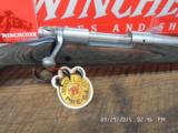 WINCHESTER MODEL 70 (MFG 1998-1999 ONLY) CLASSIC LAMINATED STAINLESS BOSS 300 WIN.MAG.DELUXE RIFLE NIB W/PAPERWORK, - 9 of 17