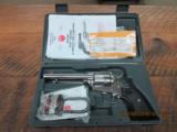 RUGER NEW VAQUERO (MFG.2009) HIGH GLOSS STAINLESS 45 COLT 5.5 INCH BBL. USED AS NEW IN ORIG.BOX WITH PAPERWORK. - 1 of 14
