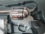 RUGER NEW VAQUERO (MFG.2009) HIGH GLOSS STAINLESS 45 COLT 5.5 INCH BBL. USED AS NEW IN ORIG.BOX WITH PAPERWORK. - 3 of 14