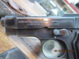 BERETTA MODEL 1934 PISTOL 380ACP CALIBER.(MFG 1942) ALL MATCHING NUMBERS W/ HOLSTER AND EXTRA MAGAZINE. - 2 of 15