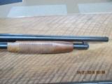 NEW HAVEN BY MOSSBERG. MODEL 600AT 12GA. PUMP WITH EXTRA STOCK AND BARREL. - 7 of 9