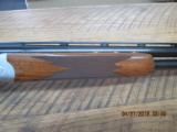 RARE RUGER RED LABEL SPORTING CLAYS 12GA. HAND ENGRAVED GOLD INLAYS MFG. 1997
- 4 of 14
