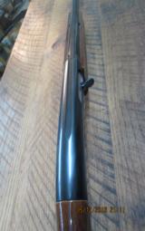 REMINGTON MODEL 1100 SEMI-AUTO 12GA. 2 3/4