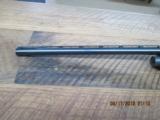 REMINGTON MODEL 1100 SEMI-AUTO 12GA. 2 3/4