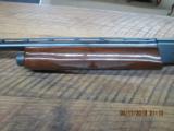 REMINGTON MODEL 1100 SEMI-AUTO 12GA. 2 3/4