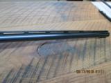 REMINGTON MODEL 1100 SEMI-AUTO 12GA. 2 3/4