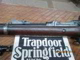 SPRINGFIELD TRAPDOOR MODEL 1873 RIFLE 45-70 GOV'T CAL. WITH BAYONET ,SCABBARD AND HARD COVER BOOK. - 4 of 26