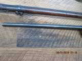 SPRINGFIELD TRAPDOOR MODEL 1873 RIFLE 45-70 GOV'T CAL. WITH BAYONET ,SCABBARD AND HARD COVER BOOK. - 7 of 26