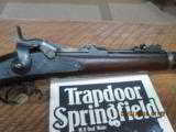 SPRINGFIELD TRAPDOOR MODEL 1873 RIFLE 45-70 GOV'T CAL. WITH BAYONET ,SCABBARD AND HARD COVER BOOK. - 19 of 26