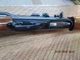 REMINGTON 1100 SEMI-AUTO SLUG GUN 12GA. 2 3/4" EXTRA 28" VENT RIB BBL. WEAVER STEEL SCOPE.98% - 14 of 16