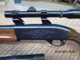 REMINGTON 1100 SEMI-AUTO SLUG GUN 12GA. 2 3/4" EXTRA 28" VENT RIB BBL. WEAVER STEEL SCOPE.98% - 3 of 16