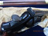 SMITH & WESSON 25-3 125TH ANNIVERSARY ( 1852-1977) EDITION 45 COLT REVOLVER S/N S&W 43XX .NEW IN FACTORY WOOD PRESENTATION CASE WITH S& W BOOK & COIN! - 6 of 20