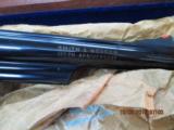 SMITH & WESSON 25-3 125TH ANNIVERSARY ( 1852-1977) EDITION 45 COLT REVOLVER S/N S&W 43XX .NEW IN FACTORY WOOD PRESENTATION CASE WITH S& W BOOK & COIN! - 5 of 20