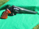 SMITH & WESSON MODEL 29
8 3/8 BARREL WITH PRESENTATION BOX AND BOX
- 4 of 10