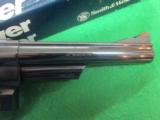 SMITH & WESSON MODEL 57-1 IN 41 MAGNUM FACTORY BLUED 6" BARREL
- 4 of 8