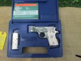 COLT MUSTANG IN BRIGHT NICKEL FINISH AS NEW IN FACTORY BOX. - 1 of 8
