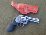 SMITH & WESSON MODEL 686-5 4INCH 6 SHOT STAINLESS STEEL REVOLVER - 1 of 10