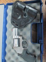 SMITH & WESSON MODEL 686-6 2 1/2 INCH BARREL 357 MAGNUM 6 SHOT STAINLESS WITH CUSTOM HOLSTER - 1 of 8