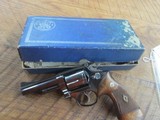 ORIGINAL SMITH & WESSON .357 COMBAT MAGNUM PRE MODEL 19 4 INCH BLUED WITH FACTORY LETTER AND BOX. - 1 of 10