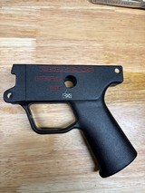 H&K MP5K 9mm 4 Position (0,1,3,F Pictogram) Ambi Plastic Trigger Housing, Clipped, used. - 2 of 3