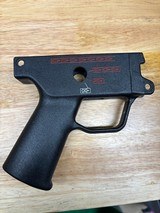 H&K MP5K 9mm 4 Position (0,1,3,F Pictogram) Ambi Plastic Trigger Housing, Clipped, used. - 1 of 3
