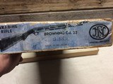 Browning Trombone .22 LR.
Three digit Very early with box - 3 of 9